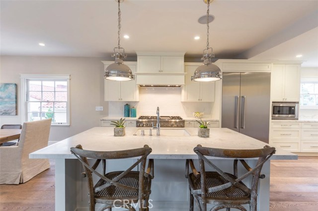 Huge center island is perfect for breakfast or an afternoon snack.