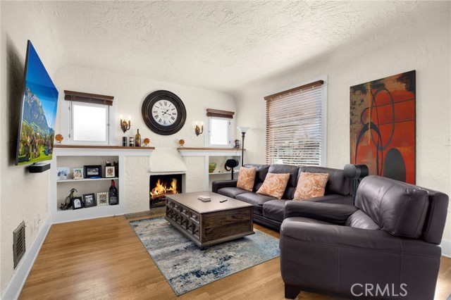 Classic wide entry door and great natural light in the living room