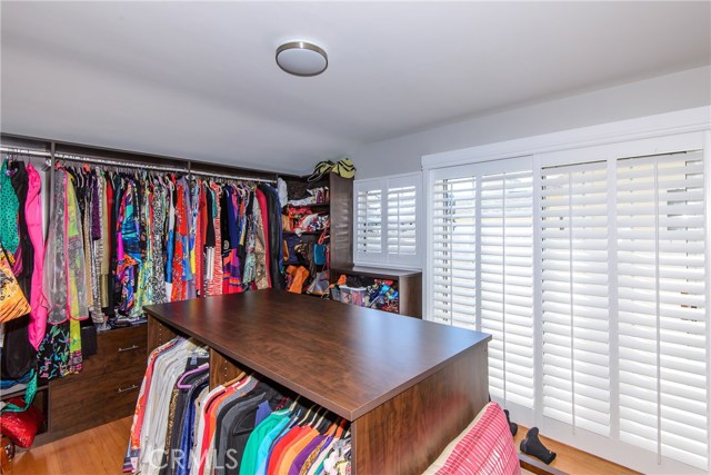 4th bedroom has been converted to a huge custom California Closet but seller will covert back to bedroom if buyer chooses!