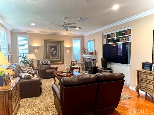 family room with gas fireplace and surround sound