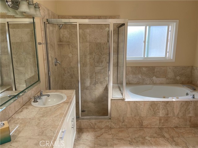 Separate shower and tub in master bathroom