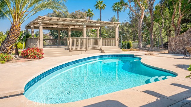 Pool and covered wooden deck