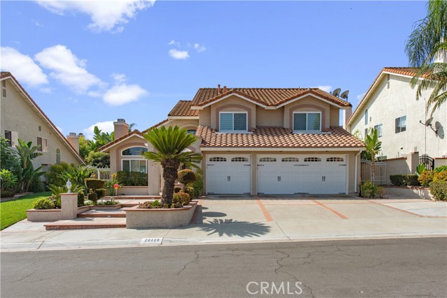 Welcome to your dream home! Nestled in the heart of Yorba Linda, this beautifully renovated residence boasts 2,769 sqft of luxurious living space on a generous 7,500 sqft lot. Featuring 4 spacious bedrooms and 3 modern bathrooms, this home is perfect for families and entertainers alike.

Step inside to discover a meticulously designed interior, highlighted by recently remodeled floors, kitchens, and bathrooms. The custom metal front door and elegant stair railing add a touch of sophistication that sets the tone for the rest of the home. New double-paned windows enhance energy efficiency, keeping the heat out and your home cool year-round.

The expansive backyard is an outdoor paradise, featuring a serene fish pond and a relaxing Jacuzzi—ideal for unwinding after a long day. With ample space to cultivate your own vegetable and fruit garden, this yard is a gardener’s delight.

Don’t miss the opportunity to make this stunning home yours! Enjoy the perfect blend of comfort, style, and functionality in one of California's most desirable communities. Schedule your private tour today!