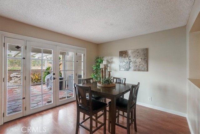 DINING AREA WITH BACKYARD VIEW