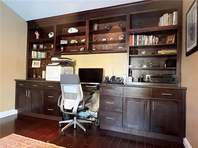 Study with built-in desk, storage and bookcases