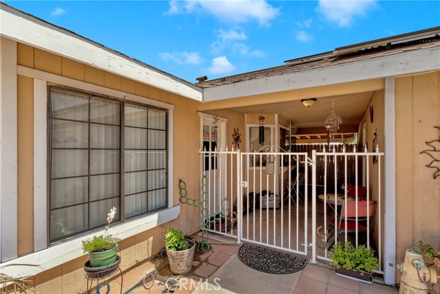 Side entry nearest the driveway features a breezeway which is a perfect little oasis of shade.