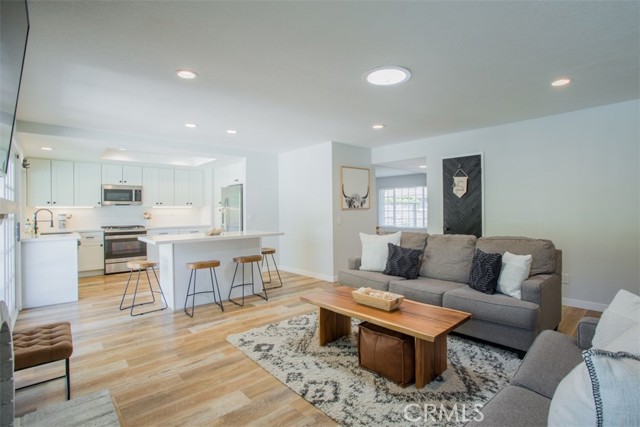 family room open concept to kitchen