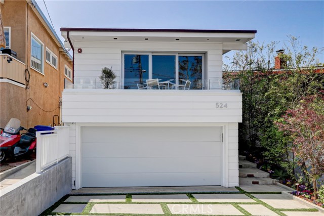 524 14th Street Manhattan Beach, California Located on one of the best streets in Manhattan Beach, this four bedroom home has recently undergone an extensive remodel with the highest quality finishes available. The property is unique and extraordinary as it consists of two lots. The main property is 30' x 120' and the sale price includes an additional 30' x 25' parcel to the south east that combined, makes this property special. The fourth bedroom can be used as an extra living room that opens to this amazing backyard with private outdoor living room, fire pit with built in benches, and a YARD!. The quality of the interior remodel must be seen to be appreciated. Additional amenities include Central A/C, high end kitchen, large rear and front deck with nice ocean views, and more.
This particular block of 14th Street is one of the most sought after in town as it is quiet, has good parking and is a short walk to downtown MB, American Martyrs school/church, award winning Pacific elementary school, parks and the BEACH!
