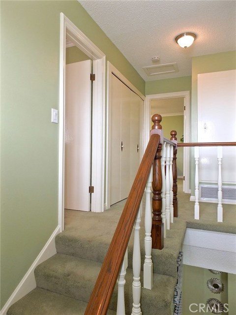 A beautiful oak banister leads the way to the upstairs bedrooms A beautiful oak banister leads the way to the upstairs bedrooms