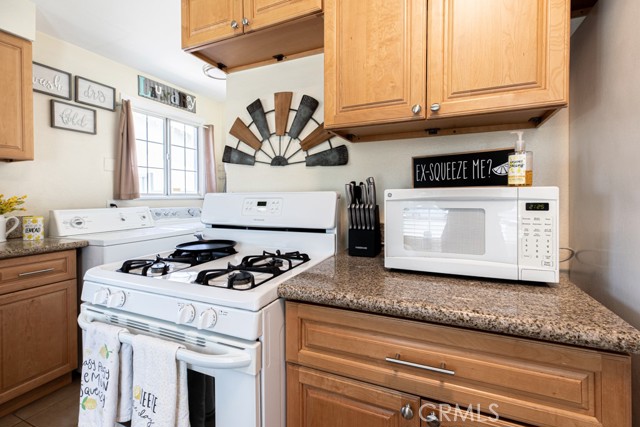 Kitchen with view of laundry area