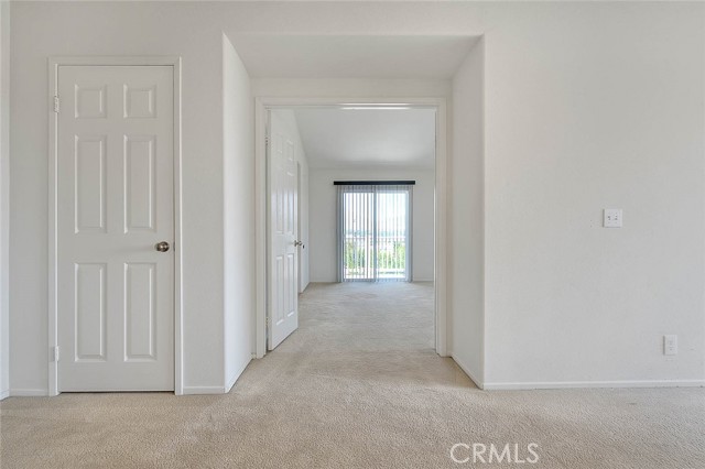 View to primary suite and its private balcony