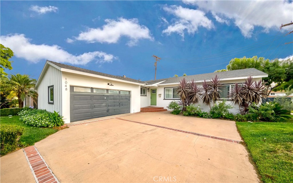 Gorgeous Remodeled Single Level Home in the High in Demand City of Santa Ana! Nestled in a prime location on a large corner lot. This newly remodeled home offers a one of a kind floor plan with 4 beds/2 baths, appx. 1,382 sq ft of abundant living space on appx. 7,000 sq ft lot! You are greeted with the beautiful lush neighborhood of Morrison/Floral Park. Stunning curb appeal w/an oversized driveway. Walk into the large open floor plan - living room w/cozy brick accent fireplace, recessed lighting, tons of windows & is light n bright, flows to the formal dining room. Elegantly remodeled gourmet kitchen w/quartz countertop & designer marble backsplash, center island/breakfast bar, custom chic white cabinets w/hardware, newer stainless steel appliances! Primary bedroom w/large closet & ensuite fully remodeled bath! Remaining three bedrooms are abundant in size w/ample closet space. Oversized fully remodeled hallway bath w/shower in tub. Backyard is an entertainer's delight w/a covered patio, large open space great for BBQ's and relaxing with family & friends, and your very own private golf putting green! 2 car garage attached garage w/newer epoxy flooring & laundry hookups. Bonus features inc: Remodeled w/no expenses spared, Brand New Furnace & HVAC, PEX plumbing throughout and new sewer lines, Remodeled Kitchen & Baths, New flooring, Double pane windows & sliding door, Recessed lighting & much more! Centrally located near shopping centers, grocery stores, schools, dining, golf course, parks, bike trails, entertainment, public transportation & easy 5 & 22 freeway commute. Don't miss out on this once in a lifetime opportunity! This one will not last!