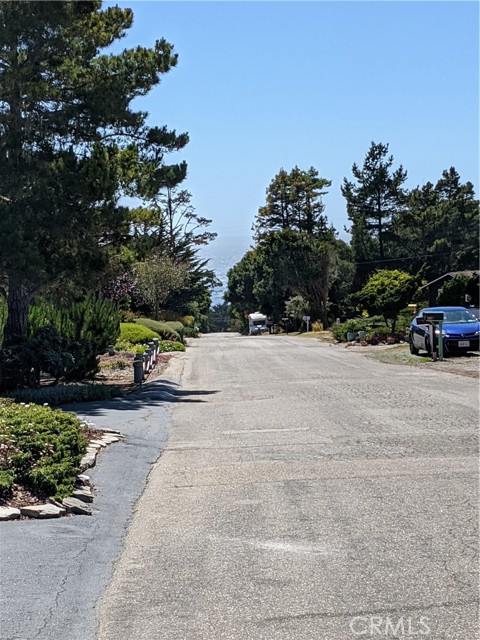 view of ocean from middle of street