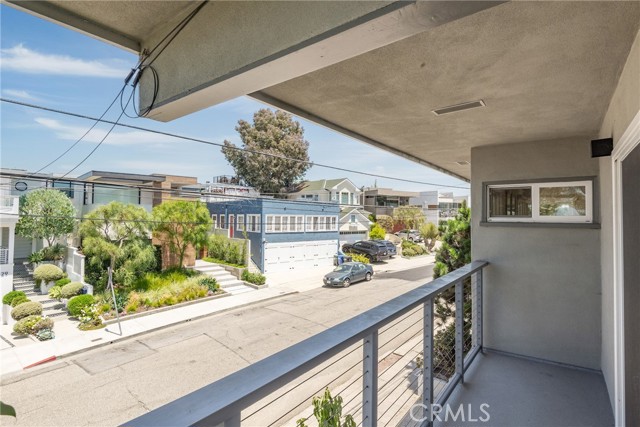 Covered balcony on the upper unit great for enjoying beach breezes