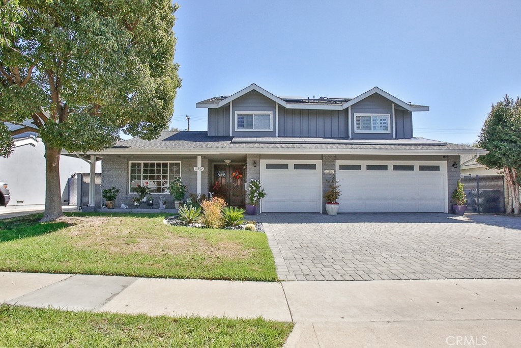 16252 Magellan Lane Huntington Beach, California Truly home sweet home!!! been upgraded throughout with recessed lighting, rich wood floors, solar panels, newer roof, AC, and 200amp electrical. Enter through the double doors to your foyer that leads to the office and to the large formal dining room with custom lighting and a very well-appointed kitchen. It features granite counter tops, stainless steel appliances, 5 burner Thermador stove top with double convection oven, wet bar, huge island and a breakfast nook with sliding doors to the backyard and flows seamlessly to the family room with crown molding, ceiling fan and cozy fireplace with a custom mantle. Convenient downstairs office or living room with beautiful flooring, built-in desks and shelves . Up the staircase, the generously sized master suite features ceiling fan, walk in closet, and an en suite bathroom with granite topped vanity and his&hers sinks. Three large additional bedrooms upstairs one with a full wall of built in drawers and shelves, share an adjacent upgraded full bathroom with two separate sinks, jetted tub and shower surrounded with travertine. Relax in the spacious backyard featuring sparkling PebbleTech pool with all new equipment, a hot tub and large grassy area, perfect for entertaining. The cobblestone driveway leads to the 3 car garage that has direct access with laundry hookups. Located on a quiet, interior lot and close to schools and close proximity to parks, beaches and Bella Terra for shopping, dining and entertainment. Welcome Home!