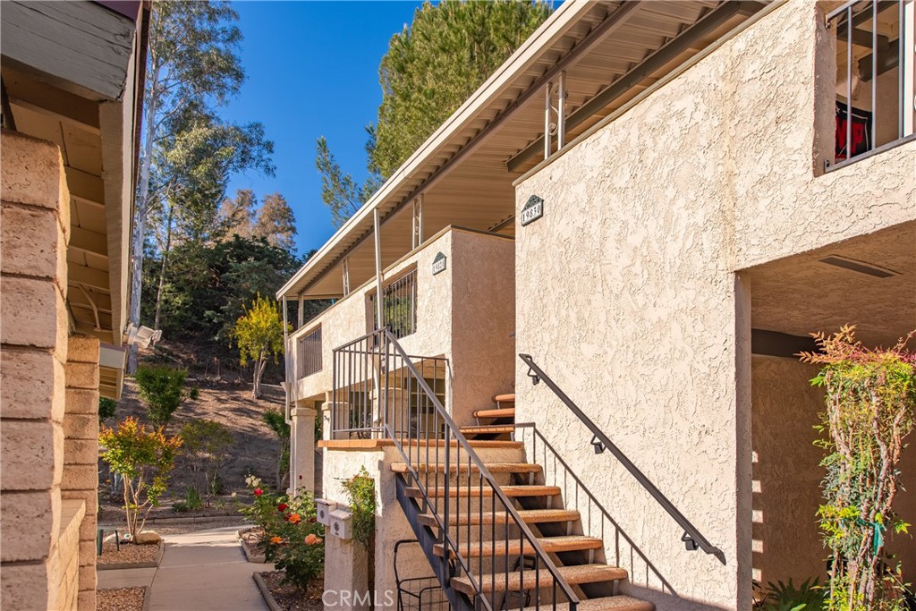 Welcome to one of FRIENDLY VALLEY's most desirable 55+ community! This charming home featuring a freshly painted, brand new flooring and kitchen counter tops. Nestled within a beautifully maintained, guard-gated community with 24-hour security, residents enjoy a wealth of resort-style amenities including a swimming pool, spa, golf course, fitness center, barbecue area, clubhouse, and even an onsite church. Additional perks include a small business center within the community and a convenient tram service that provides transportation within a 5-mile radius to local, shops and attractions. Whether you're relaxing at home or engaging in the vibrant community life, this home offers the perfect balance of comfort, convenience. and lifestyle.