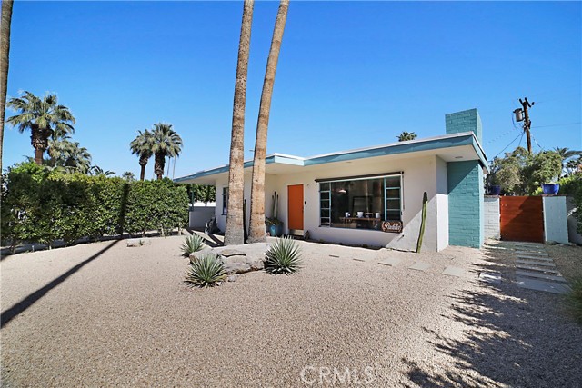 560 S Vista Oro Palm Springs, California Step into a time and space where the drinks flow freely, the music hums in the background and entertaining is the only thing that matters. No matter which way you face, you are destined to meet a spectacular view of the San Jacinto mountains. This Mid Century Contemporary home nestled in the warm sands area embodies the very essence of Palm Springs. It features a modern kitchen equipped with quartz counter tops, a stainless steel appliance package and a gorgeous drop down hood that is sure to inspire the inner chef in you! Never skip a beat while hosting a dinner party with the open floor concept that graciously connects to the living area. Newly planted ficus trees have been meticulously placed to offer privacy and in deed yet another entertaining space surrounded by gorgeous panoramic views. Make a splash with a refreshing pool party, it is Palm Springs after all. If you haven't fallen in love already, let me entice you by adding that this home has many upgrades such as sleek epoxy flooring throughout, copper plumbing, updated electrical, a combo gas and electric fireplace to cozy up next to, central air, newer drywall and insulation and to top off smart home connections. This home is also centrally located to Downtown Palm Springs where you can enjoy shopping, restaurants and entertainment. This home sits on a 6000 plus sqft lot offering potential to add additional square footage to this home. This home will not last. Book your showing appointment today!