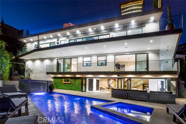 1680 Sunset Plaza Drive Los Angeles, California Resting high above the Hollywood Hills, this entertainer's dream home offers sweeping views of the Los Angeles skyline. This new construction home has been meticulously designed with ultra high finishing’s and comes fully finished. Very light and bright, all entertaining rooms open to large private decks with a pool and spa. The spacious rooftop deck offers plentiful outdoor seating area, see through floor view to the main living area, outdoor kitchen and a look over to the pool area. The open floor plan features a gourmet eat-in kitchen with adjacent family, dining room, office, 3 en-suite guest bedrooms, and a luxurious master bedroom with huge closets and bath. Extra features include theatre, walk-in wine cellar, and 2-car garage. Home also boasts smart technology throughout. This estate is the essence of luxury.
This home can be sold in conjunction with 1610 Viewmont Dr. (PW21030690) and 1623 Viewmont Dr. (PW21030708). All three homes have historically been rental properties and have an exemplary rental history. Included in the sale is the option for the rental website domain and access to a 55-broker network.