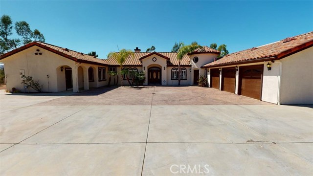 23300 Baxter Road Wildomar, California Back on Market New & Improved! Check out the 3-D for newest photo’s and feel of this property! Ready for immediate move-in! This property provides acreage, privacy & has it's own 600ft Spring Well. Was Baxter Rd is now Wildomar Trails from the 15 FWY. Super easy freeway accessible but not too close. Gated property with custom iron gate leads to the Barn that the Seller has plans to make a Barndominum like Guest House that can be used for so much! There are several fruit trees such as orange, blood orange, pomegranate, apricot and more! Tons to grow a garden! Exterior & Interior just painted! Enter the Estate into Foyer overlooking into the Formal Living Room looking out to Pool, Dining Room and also Office. Check out the large chef kitchen with granite counter tops and island open to the Family Room with fireplace. All bedrooms are in the opposite wing with Master Bedroom with sliding doors to backyard pool or French door to Hot Tub on one of many patios. Two secondary bedrooms that have jack-n-jill bathroom plus both rooms have sliders to patios. There is also a fourth bedroom that has access to full hallway bath. Head out to the backyard to enjoy beautiful pool & view! Below pool area more useable land that has trees & cleared area for camping. Property has Three RV Hook up & clean-out!