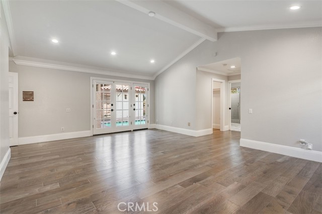Master bedroom that leads out to the pool/backyard.