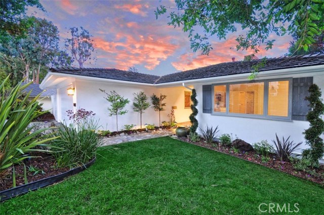 This large cottage style home has wonderful curb appeal.