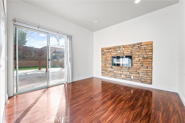 first floor bedroom with patio sliding door