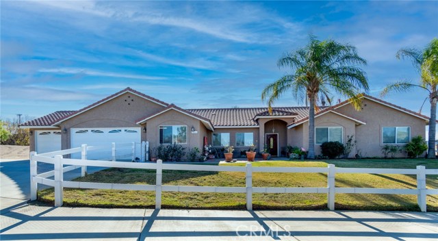 14655 Wood Road Riverside, California Stunning Ranch Style Home, Single Story w/Countryside feel. Conveniently near shopping centers in quiet neighborhood. Situated on 2.38 acres w/potential to add new structure & you can have livestock. Fenced in front yard opens up to large courtyard. Interior features vaulted ceilings, crown molding, & lots of natural light. Recessed lighting, ceiling fans, & modern light fixtures. New carpet & tile throughout house. Features 2 large open living spaces. Recently updated kitchen w/granite countertops & stainless appliances. Kitchen features large walk in pantry & opens into family room & breakfast nook. Family room w/large stone fireplace & custom mantle. Master bedroom has sitting area, built in bookshelf, & fireplace. Large master walk in closet w/custom built-ins. Mastersuite bathroom w/jacuzzi tub & built in shelving. Nicely sized bedrooms w/separate office, great if you need home office! Livingroom views backyard & w/direct access to pool & spa. Lg custom pool w/large shelf, waterfalls, slide, & removable pool fence. Lg spa overlooks pool. Property features fruit trees: lemon, key lime, grapefruit, lime, tangerine, nectarine, plum, avocado, pomegranate, naval orange, & valencia orange. Several sitting areas & patios throughout property w/2 water fountains. House features ring doorbell, smart thermostat, & smart garage door opener. Garage fits 3 cars w/space for home gym & rafters for overhead storage. Beautiful home & property w/numerous features. Don’t miss out!