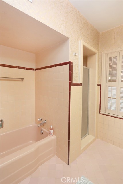 Front bathroom located off foyer, and between two front bedrooms