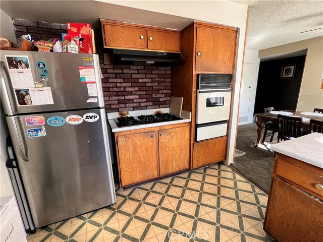 Kitchen opens to dining room