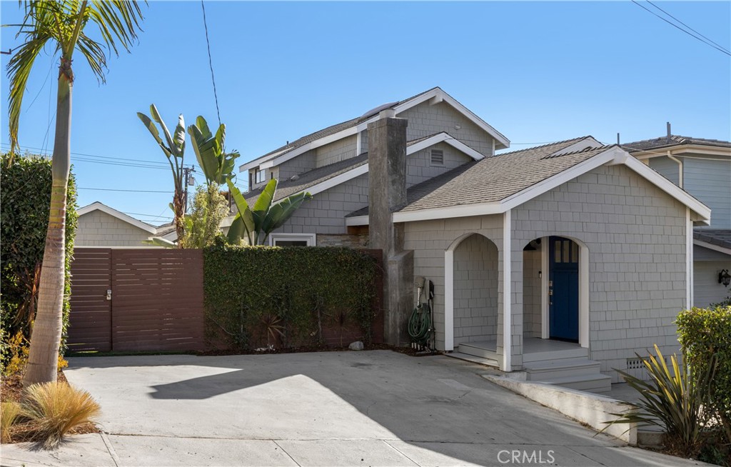 900 14th Street Hermosa Beach, California Experience the best of beach living! This beautifully renovated single family home has a happy and sunny personality, complete with ocean views, a great layout, a yard, and a terrific location on a quiet, one-way street atop Pier Ave. at the center of life in Hermosa Beach. It’s just steps to shopping, restaurants and the beach, yet enjoys the benefits of being situated on a 50’ wide lot which affords multiple outdoor spaces and a feeling of “elbow room.” The interior has a relaxed beach vibe with refinished wood floors throughout, freshly painted crisp white walls, designer materials, and updated kitchen/bathrooms. The ground level includes a living room, dining room, two bedrooms, full bath and kitchen with a built-in breakfast nook that flows to a protected outdoor dining area with views. Its built-in bench seating provides the perfect setting for fun times with friends and family. Here, the outdoor space abounds. Adjacent to the outdoor dining area is a wonderful deck for a BBQ and lounging after meals, plus a gated turfed driveway which is perfect for play. An outdoor shower and board storage supports an active beach lifestyle. Upstairs is a one-of-a kind penthouse with a separate office and primary bedroom suite with stunning panoramic ocean views. The large bedroom has wall-to-wall windows that frame the views, high ceilings, walk-in closet and a newly renovated bath with gorgeous tile, double vanity with carrara counters, frameless shower and designer fixtures. Enjoy more beautiful views from the deck off the bedroom, which leads to the office. What a place to work and be inspired! It’s all here waiting for you.