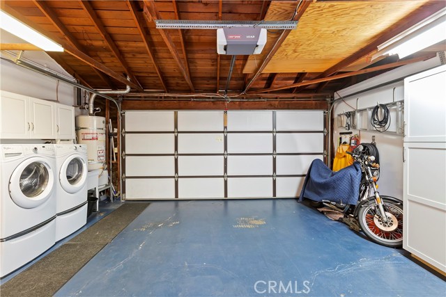 Garage with Laundry Area - A place to store your cars and get your laundry clean.