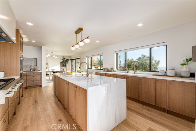 Ocean view kitchen with white oak cabinet