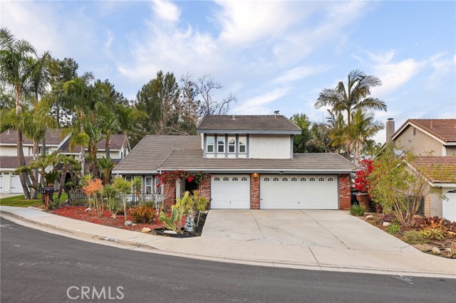 Stunning 5 bedroom property, once a model home, is located in a quiet cul-de-sac within one of Anaheim Hills' most prestigious neighborhoods, offering breathtaking mountain and tree views. You'll be welcomed by a long, private driveway leading to the 3-car garage.

Step through the double doors and into an inviting, spacious floor plan flooded with natural light. The home features recessed lighting, soaring two-story ceilings, and an abundance of windows and skylights, creating a bright and airy atmosphere throughout. The kitchen boasts elegant granite countertops, white cabinetry, stainless steel appliances, and a large eat-in bar perfect for casual dining. This space opens seamlessly into the cozy family room, complete with a charming fireplace. There is also a formal dining room, perfect for entertaining.

The home has been thoughtfully upgraded with dual-pane windows, stylish wood flooring upstairs, and easy-to-maintain tile flooring downstairs. A recent professional addition enhances the home's living space, featuring a spacious upstairs balcony with panoramic views that are perfect for enjoying sunsets. Downstairs features an expansive entertainment room, 1 bedroom with large closet and 1 full bath.


The luxurious primary suite offers a true retreat, with a spa-like ensuite bathroom. Outside into the backyard, you'll find an entertainer’s paradise with a large patio, surrounded by mature trees offering seclusion. Enjoy the convenience of artificial grass, a raised wood deck area with gazebo, and a tranquil fountain, making this a serene outdoor oasis.


Additional features include a 3-car garage with ample storage cabinets. The home is centrally located with easy access to top-rated schools, shopping centers, fitness clubs, Imperial Park and Pelanconi Park, a 27-acre park with beautiful trails and streams. Plus, the 91 freeway is just moments away, providing quick and easy transportation. Low HOA fees, come see it today!