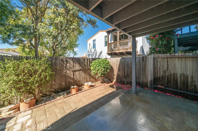 Backyard with covered patio and garden