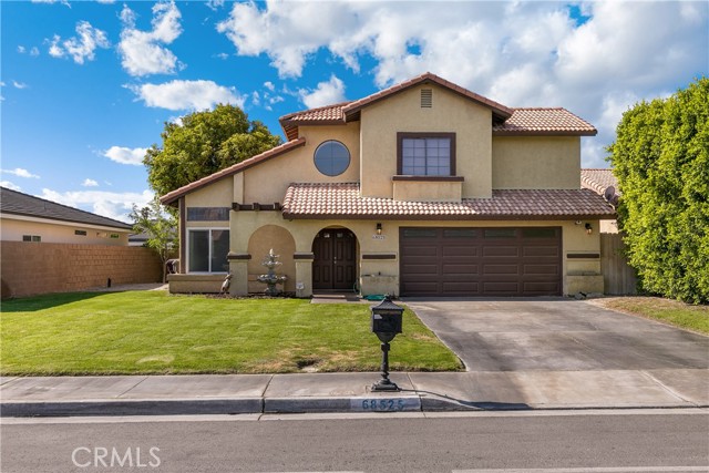 68525 30th Avenue Cathedral City, California This home has the WOW factor. Almost 3,000 sq feet of living space allowing 5 Bedrooms and 4 1/2 Baths. Front Entry way opens to vaulted ceiling Living Room with adjoining Dining area giving out plenty of natural light. Kitchen is adjacent to the Den that has a cozy fireplace for cold winter nights and an area for an over-sized Dining table with enough space to fit the entire family. Downstairs there is a "permitted" Bedroom and full bathroom. Completing the downstairs is a half bath & laundry. The remaining 4 bedrooms are upstairs each with their own ceiling fan to provide a comfortable breeze. The master bedroom is over-sized allowing an area for an office/couch. The bathroom has been upgraded with double sinks, jetted bath and walk in shower. The backyard provides Lemon, Walnut, Guava, Mango, Orange and Pomegranate trees surrounded by a block wall. RV parking and dump station is also a great add-on. Your dream home awaits!