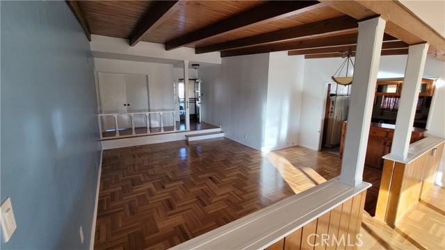 Living room, looking towards front entry.