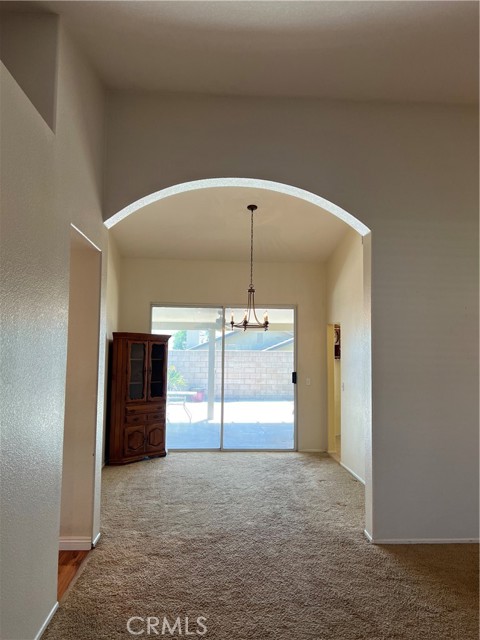 Vaulted ceilings in living room to dining room