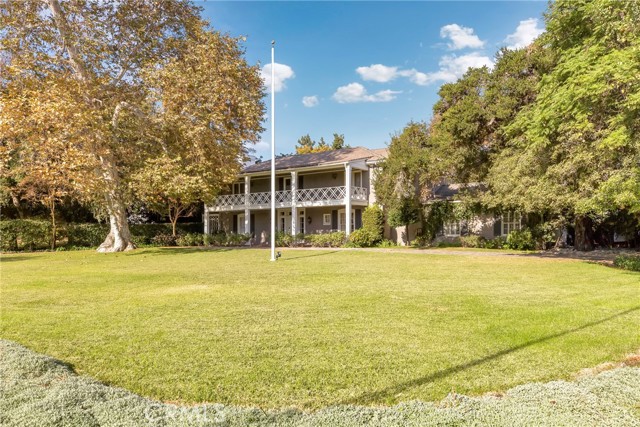 3585 Locksley Drive Pasadena, California Welcome to beautiful Locksley Dr in the Chapman Woods neighborhood of Pasadena. This gorgeous French-style estate sits on an over 1.14 flat acre of land, offering a wonderful place for family and friends to gather and entertain. The grounds feature a large front yard with a circular concrete driveway, and a back yard which has a swimming pool, and Jacuzzi. The main house offers 4,255 SF and features 4 bedrooms and 3.5 bathrooms, a welcoming entry, formal living room with fireplace, formal dining room, and a den/office that can be used as a 5th bedroom. The backyard is a spacious gathering place, and features a fireplace, a breakfast area, plenty of storage. Adjacent to the garage, there is a large storage space. You could design and build another house on the backyard. This amazing property just awaits for a new family!