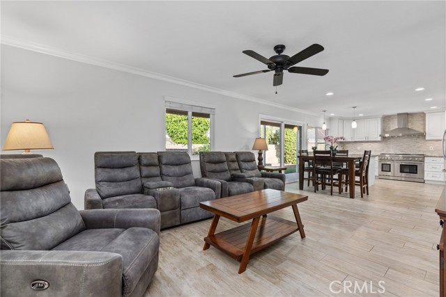 The beautiful neutral colors and open concept really makes this room inviting!