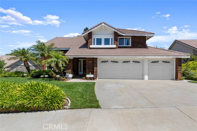 You’re sure to love this BEAUTIFULLY MAINTAINED and IMPECCABLE CLEAN VISTA ROYALE HOME as much as its ORIGINAL OWNERS HAVE! It’s in the attendance area for FANTASTIC VILLA PARK SCHOOLS, including Serrano, Cerro Villa and Villa Park High, and walking distance to Lutheran High! Perfectly located on a SINGLE LOADED STREET, there’s no shortage of parking! The LIGHT AND BRIGHT floor plan boasts a LIVING ROOM, SEPARATE FAMILY ROOM and a ROOMY MASTER SUITE with double sinks, a roman tub, separate shower and a WALK-IN CLOSET. The kitchen, with its sizable breakfast area and large pantry, opens to the FAMILY ROOM, which has HARDWOOD FLOORING and a BRICK WOOD BURNING FIREPLACE. VAULTED CEILINGS are in the master suite, as well as in the living and dining rooms. There’s also a large, separate INDOOR LAUNDRY ROOM and an attached 3 CAR GARAGE with direct access. The PRIVATE, LUSH rear yard has a COVERED PATIO and generous lawn area. This quiet, hillside location is convenient to virtually everything! You’re sure to love this BEAUTIFULLY MAINTAINED and IMPECCABLE CLEAN VISTA ROYALE HOME as much as its ORIGINAL OWNERS HAVE! It’s in the attendance area for FANTASTIC VILLA PARK SCHOOLS, including Serrano, Cerro Villa and Villa Park High, and walking distance to Lutheran High! Perfectly located on a SINGLE LOADED STREET, there’s no shortage of parking! The LIGHT AND BRIGHT floor plan boasts a LIVING ROOM, SEPARATE FAMILY ROOM and a ROOMY MASTER SUITE with double sinks, a roman tub, separate shower and a WALK-IN CLOSET. The kitchen, with its sizable breakfast area and large pantry, opens to the FAMILY ROOM, which has HARDWOOD FLOORING and a BRICK WOOD BURNING FIREPLACE. VAULTED CEILINGS are in the master suite, as well as in the living and dining rooms. There’s also a large, separate INDOOR LAUNDRY ROOM and an attached 3 CAR GARAGE with direct access. The PRIVATE, LUSH rear yard has a COVERED PATIO and generous lawn area. This quiet, hillside location is convenient to virtually everything!