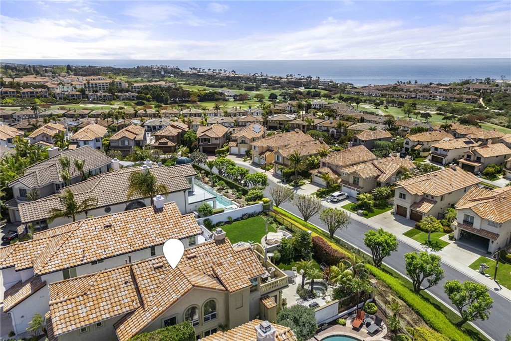 This beautifully maintained, Mediterranean-inspired property rests directly above Monarch Beach offering stunning ocean and canyon views.
Behind the gates of the Ritz Pointe community, this 3 bedroom and 2.5 bathroom home features upgrades throughout including a rare interior elevator, a combination of marble and wood flooring with Venetian plastered walls throughout and a gourmet kitchen with a stainless steel Viking range and ovens. A custom iron gate at the front entry welcomes you into the split floor plan where you will find the main living areas, the primary suite and the expanded observation deck capturing huge Catalina and sunset views on the upper level. The lower floor showcases 2 secondary bedrooms, one expanded, an additional office space and seating area with direct access to the turfed rear yard and waterfall spa. Newer HVAC, security system and solar panels round out this serene, refined coastal offering.