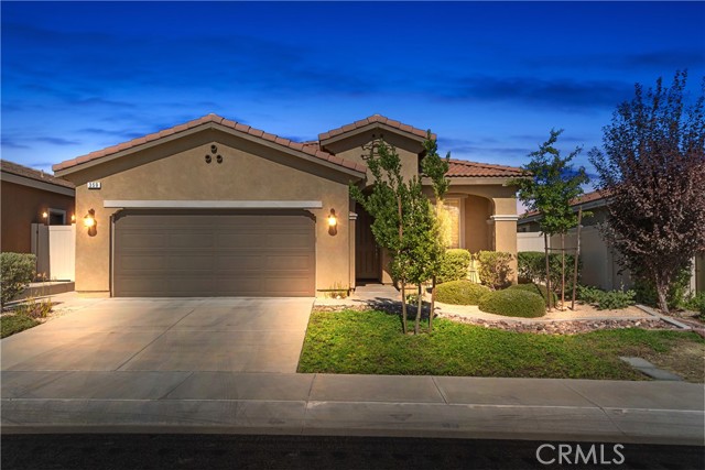 359 Linnea Fields Beaumont, California IMMACULATE 'RETREAT' Model (ONE STORY Home with 2 Br 2 BA + Den/Office), Located in Four Seasons, an Active Adult 55+ Community. What a pleasure to enter a home with such Panache & Style!! Lovely Spanish Porch in front of Home to sit and enjoy Neighbors strolling or jogging by; Interior Foyer; Great Room Concept which is Open & Light with Large windows; A Custom Fireplace with Built-ins on each side for storage and Decor Display; Plantation Shutters; An Entertainers Kitchen with Crisp White Cabinetry, Stainless Steel Knobs & Pulls; Pullouts in Cabinets; A Butlers Pantry; Large Granite Kitchen Island & Granite Counters; Spacious Primary Bedroom en suite; Quartz Counters in Bathrooms; A Private Back Yard with Oversized Alumawood Patio Cover, Water Feature and Views of the Mountain Tops for Wonderful Indoor/Outdoor Enjoyment of this Impeccably Maintained Home. Price includes the Fountain in Back Yard. FOUR SEASONS features: Restaurant that Delivers; THREE Club Houses; Beauty Salon; Massage Parlor and Facial Salon; THREE Swimming Pools & Spa Areas with one Indoor Heated Pool; Movie Theatre; Billiards, 3 FITNESS CENTERS with state-of-the-art equipment, BBQ & Picnic Areas, Tennis Courts; Pickle Ball/Paddle Tennis, Shuffleboard, Horseshoe and Putting Green, 6+ MILES of Nature/Hiking Trails; DOG PARK, and So Many Wonderful Activities & Clubs to meet new Friends and be as Active as you choose. FOUR SEASONS is approximately 30 miles from Palm Springs, at a higher elevation for a cooler climate to experience all of the four Seasons; Close to Shopping Centers, (including the World Famous Cabazon Outlet) Restaurants & Casinos, MEDICAL CENTERS/FACILITIES (Literally across the street from Loma Linda & Beaver Medical) - This Picturesque Community is surrounded by rich ranch lands with a Scenic backdrop of 2 Mountain ranges.