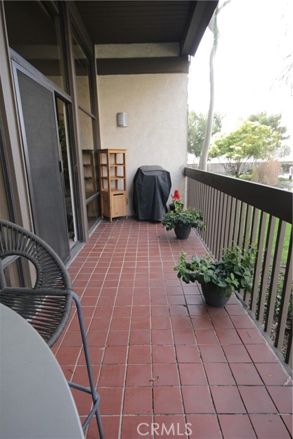 Extra wide 22' tiled balcony!  Perfect for barbecuing!