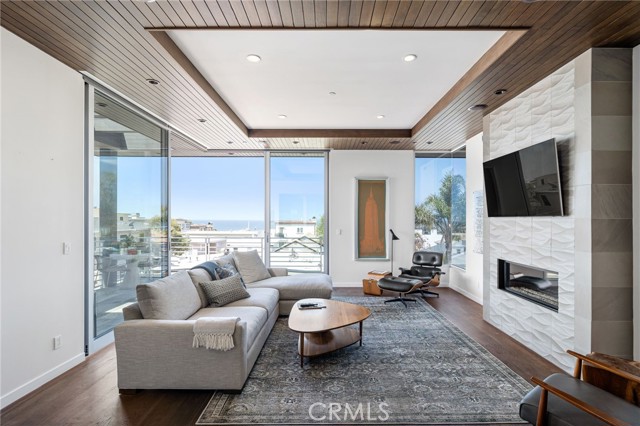 Beautiful living room. Floor to ceiling glass doors