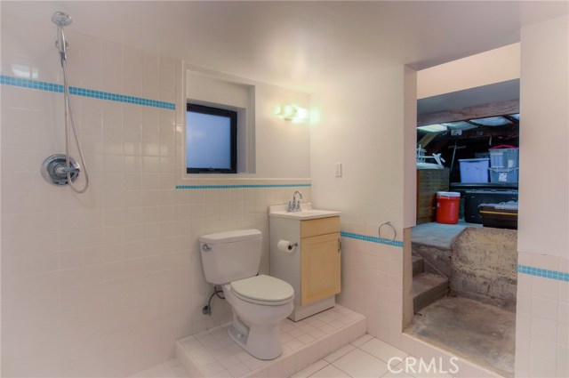 Bath room in garage. Storage area deep in back of garage