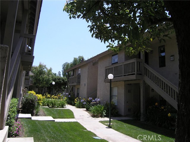 This home is an end unit with only one attached wall. Walk through the grassy greenbelts.