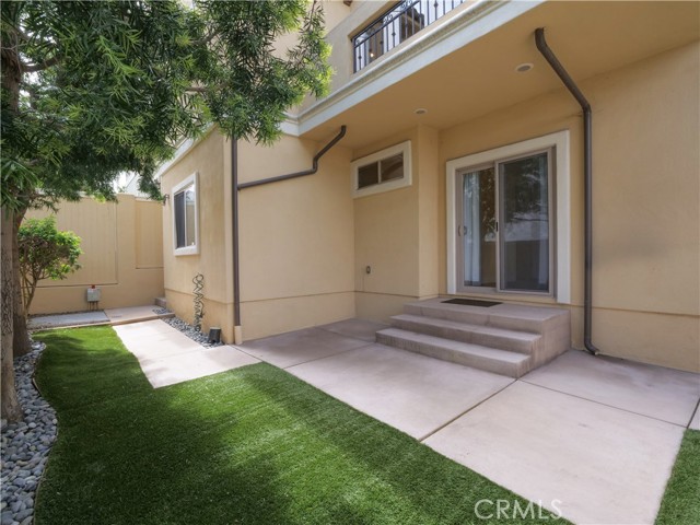 Rear patio and access to yard.