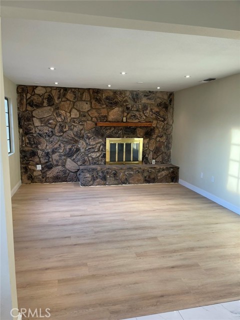 FAMILY ROOM WITH CHARMING FIREPLACE