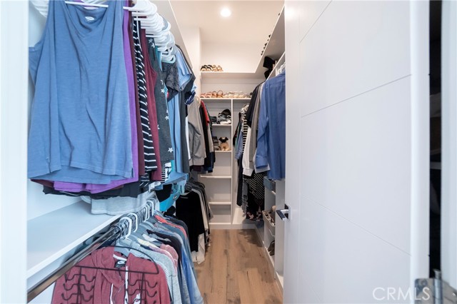 Large walk-in closet is enough space for two