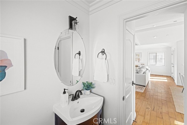 Powder room adjacent to living room.